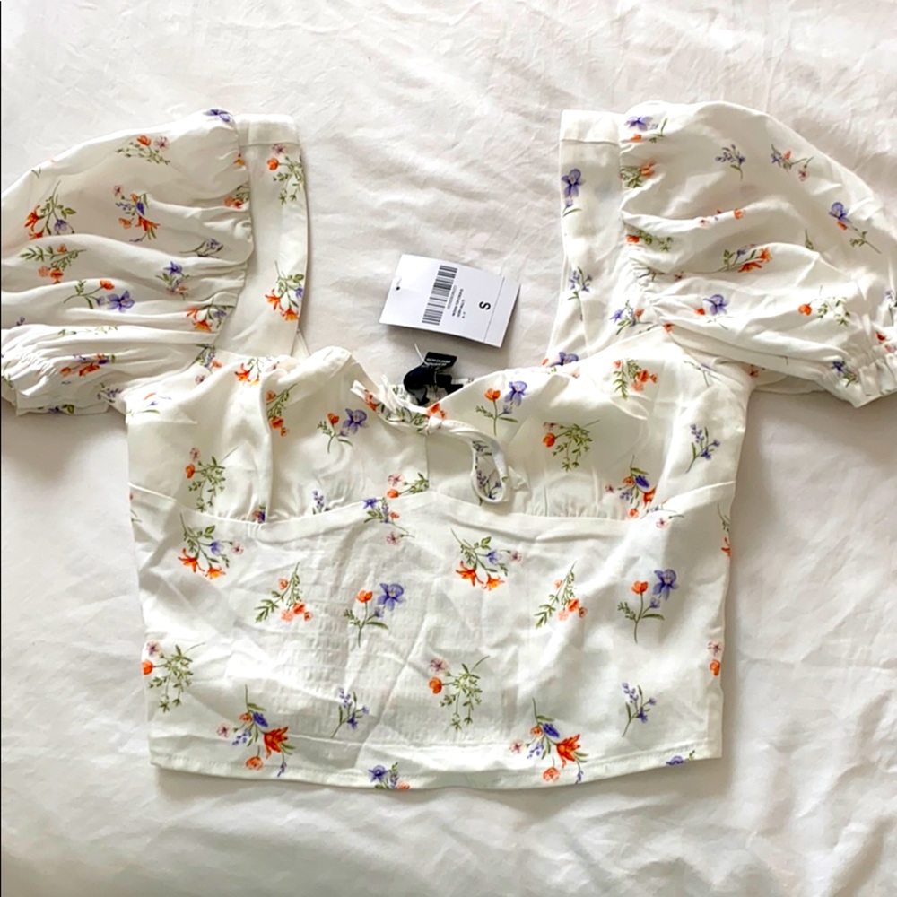 White floral crop top with puffy sleeves